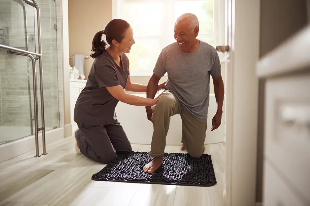 Bathroom safety with caregiver support for seniors