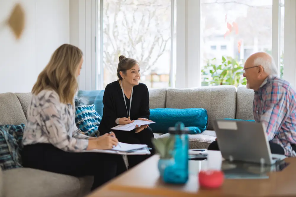 Family meeting with caregiver to discuss care needs